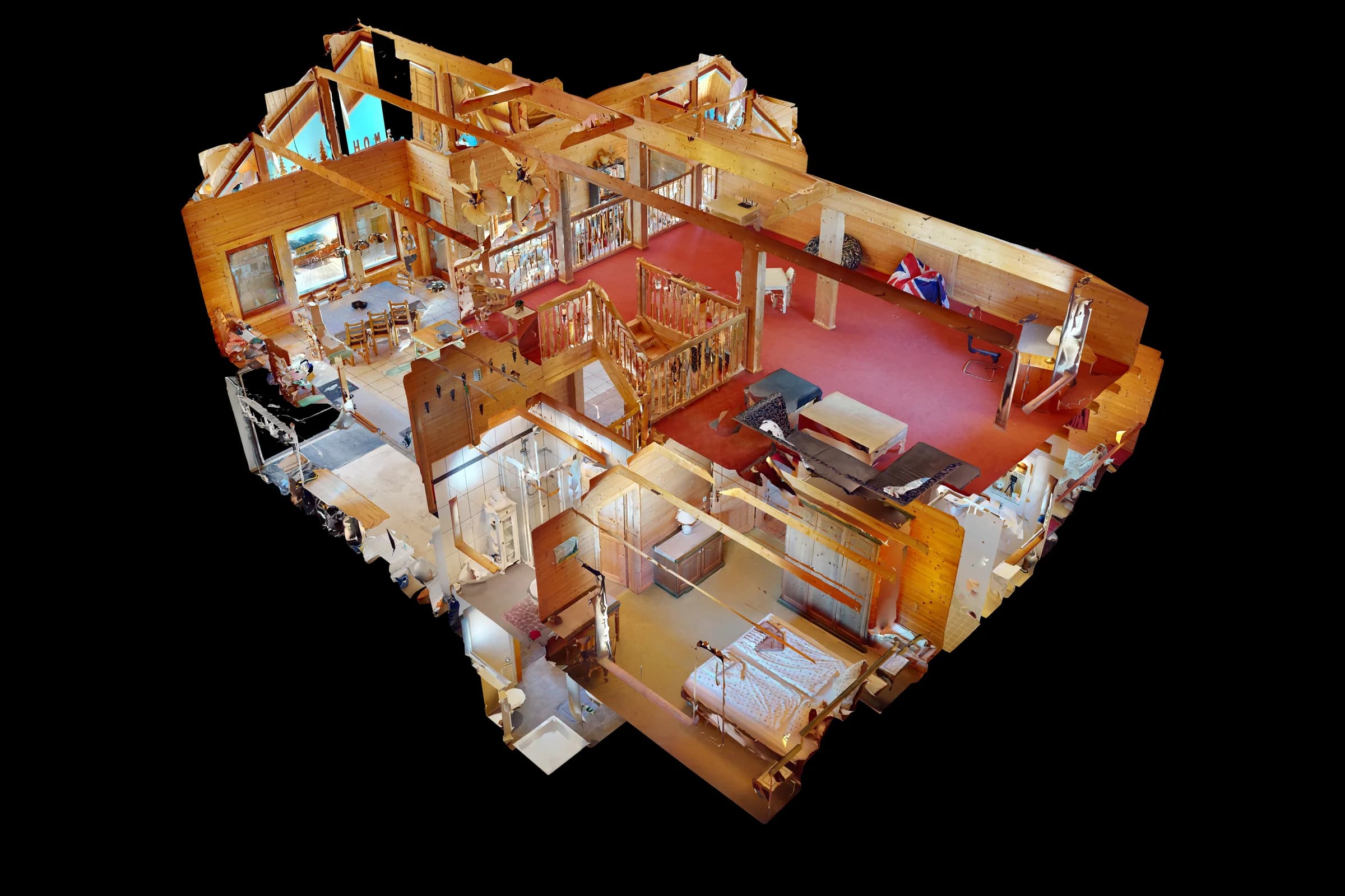 Das dreidimensionale Modell des Apartments in der Arlberg Kandahar Lodge von schräg oben, ohne Dach: der Wohnraum mit rotem Boden unter dem Holzgiebel, die Treppe und die Zimmer darum herum.