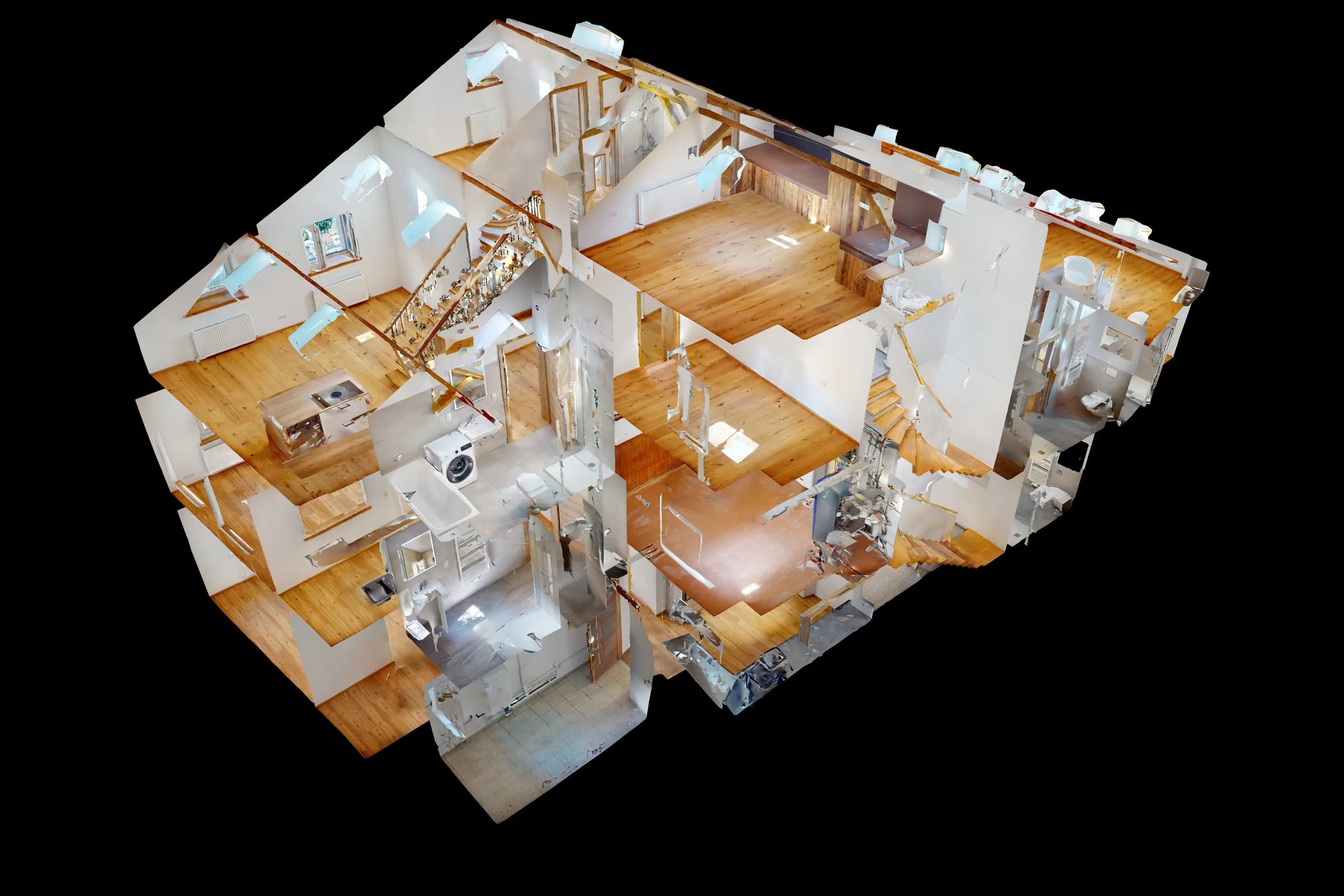 Das dreidimensionale Modell des Hauses in der Maisengasse in Landeck von schräg oben, ohne Dach: die Wohnungen über mehrere Geschosse mit Holzböden, Treppenhaus und Bädern.