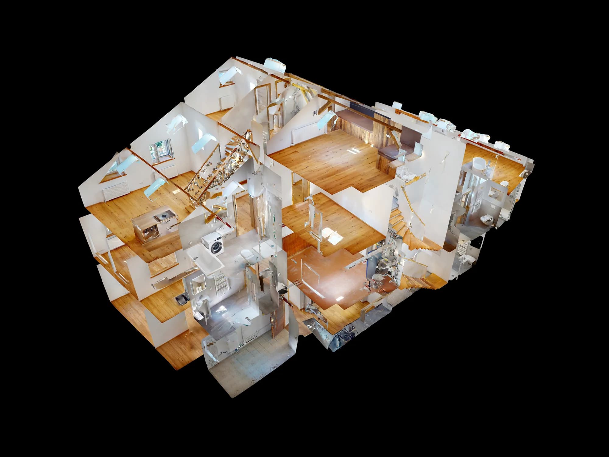 Die Puppenhausansicht aus dem Rundgang: das sanierte Haus in der Maisengasse als dreidimensionales Modell von schräg oben, alle Geschosse aufgeschnitten und die einzelnen Wohnungen nebeneinander sichtbar.