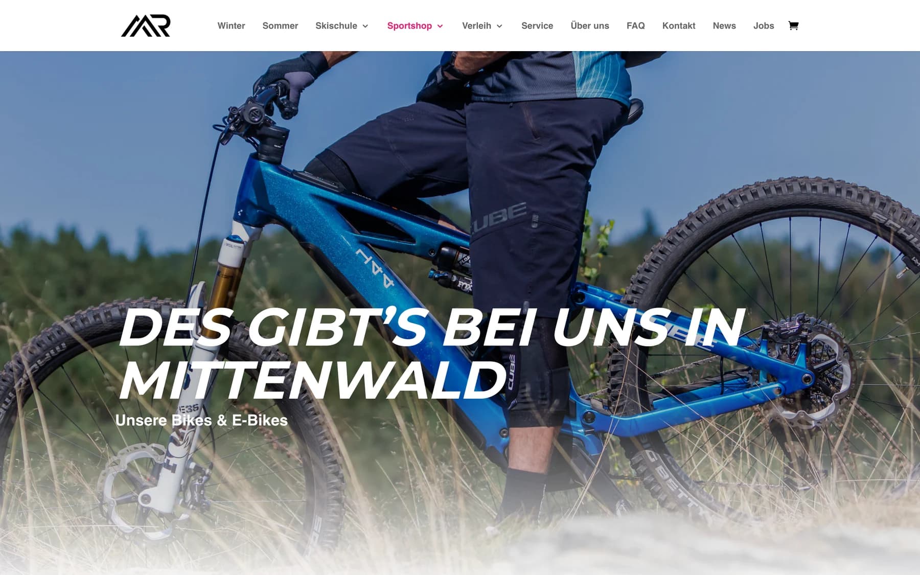 Die Seite des Bikecenters mit dem Titel Des gibt's bei uns in Mittenwald über einem blauen E-Bike.