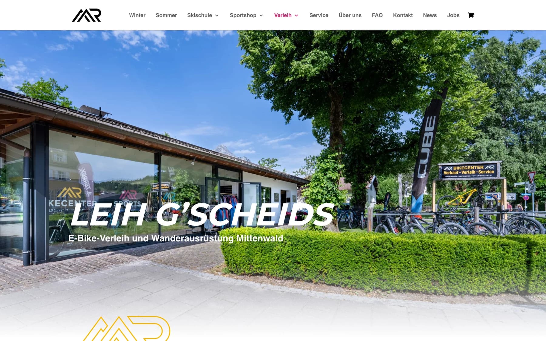 Die Verleihseite mit dem Titel Leih g'scheids über der Glasfront des Bikecenters.