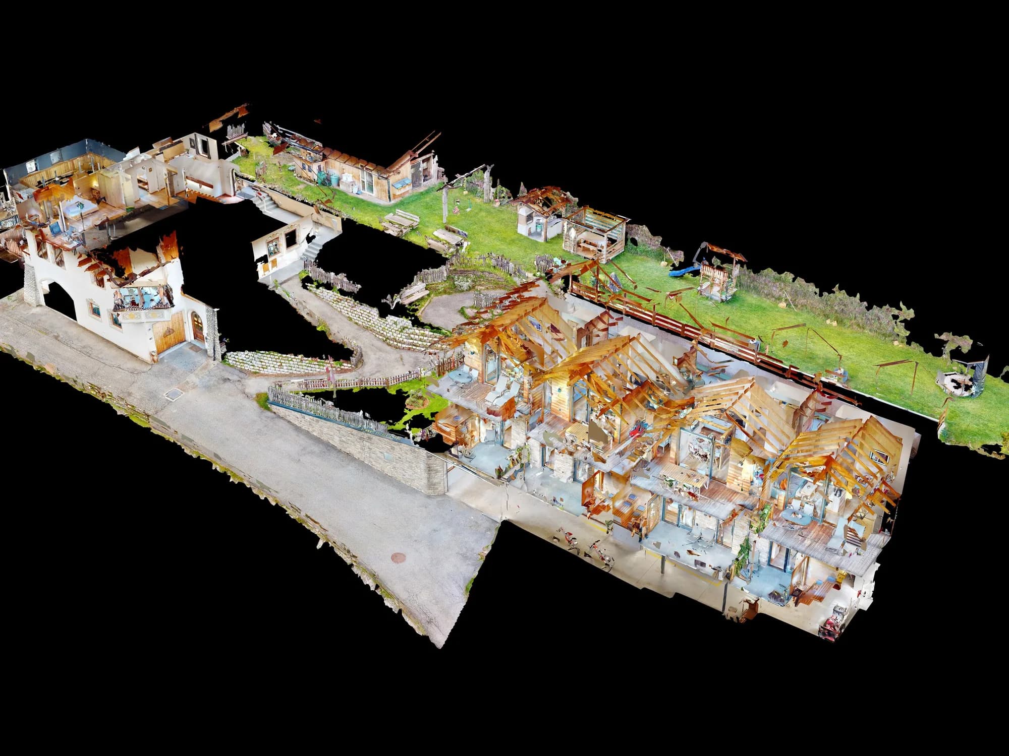 Das 3D-Modell des Stabinger Hof von schräg oben auf schwarzem Grund, die Dächer abgenommen, sodass alle Räume der Chalets und des Bauernhauses zu sehen sind.
